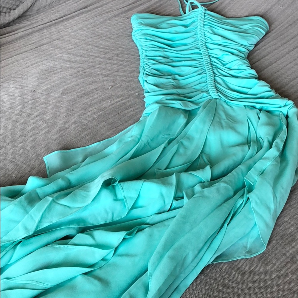 Never worn!  VERY flattering! Silk Chiffon dress.